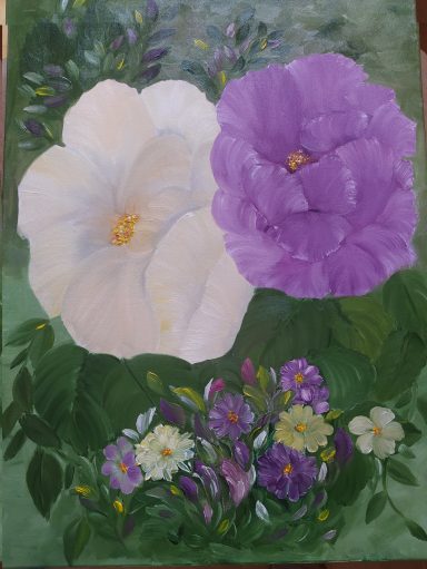 Zwei große, blühende Blumen in Weiß und Violett, umgeben von bunten Frühlingsblüten.